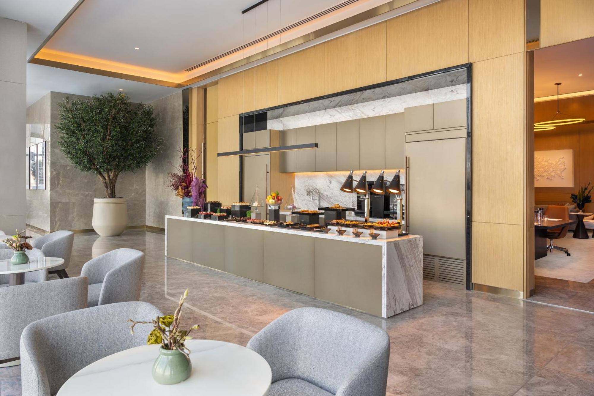 Address Creek Harbour Hotell Dubai Eksteriør bilde The lounge at the airport