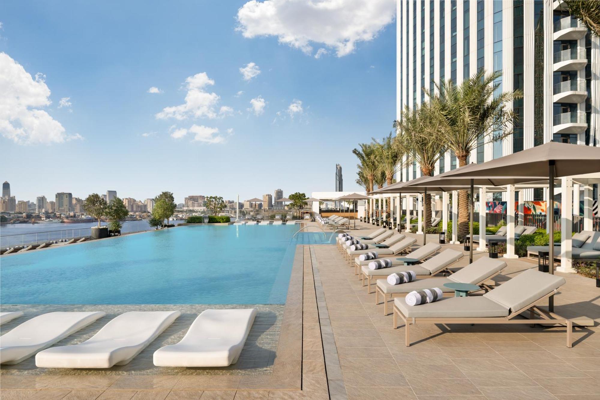 Address Creek Harbour Hotell Dubai Eksteriør bilde The swimming pool at the hotel
